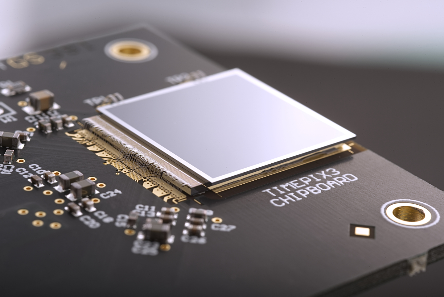The Timepix3 chip is a multipurpose hybrid pixel detector developed within the Medipix3 Collaborations, having applications within medical imaging, education, space dosimetry and material analysis. (Image: CERN) (Image: CERN)
